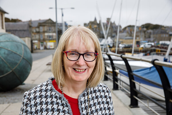 Beatrice Wishart infront of Lerwick harbour