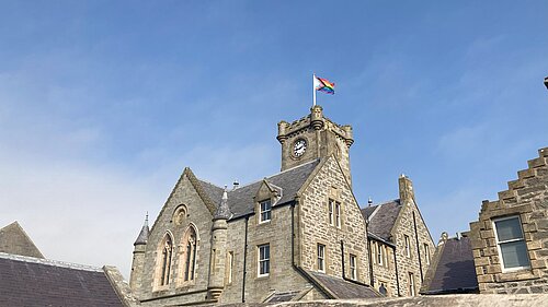 Lerwick Town Hall flying the Pride flag
